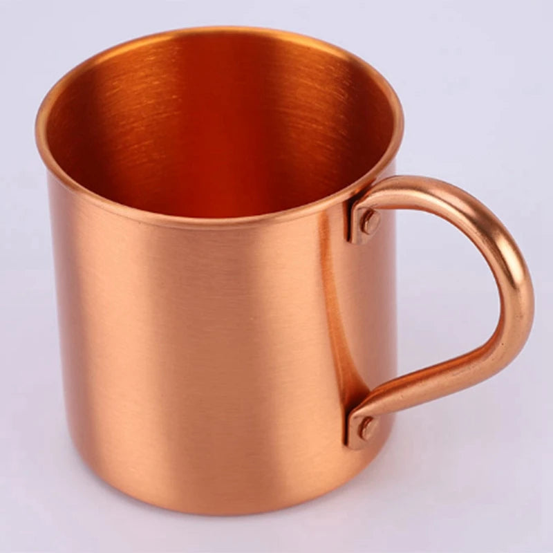 Copper mug on a light gray background