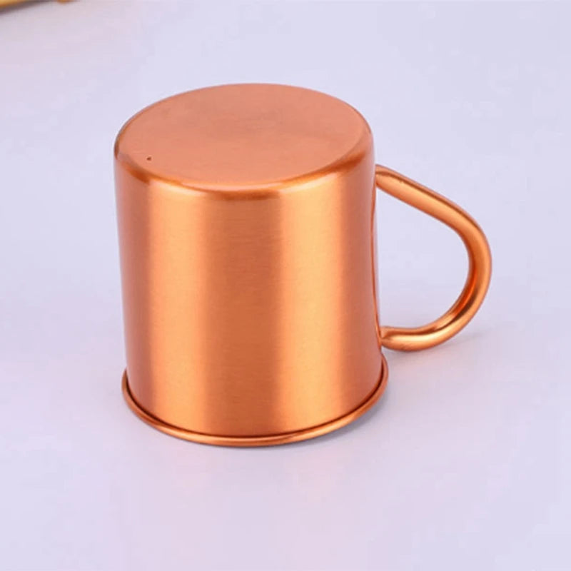 Copper-colored mug on a light gray background