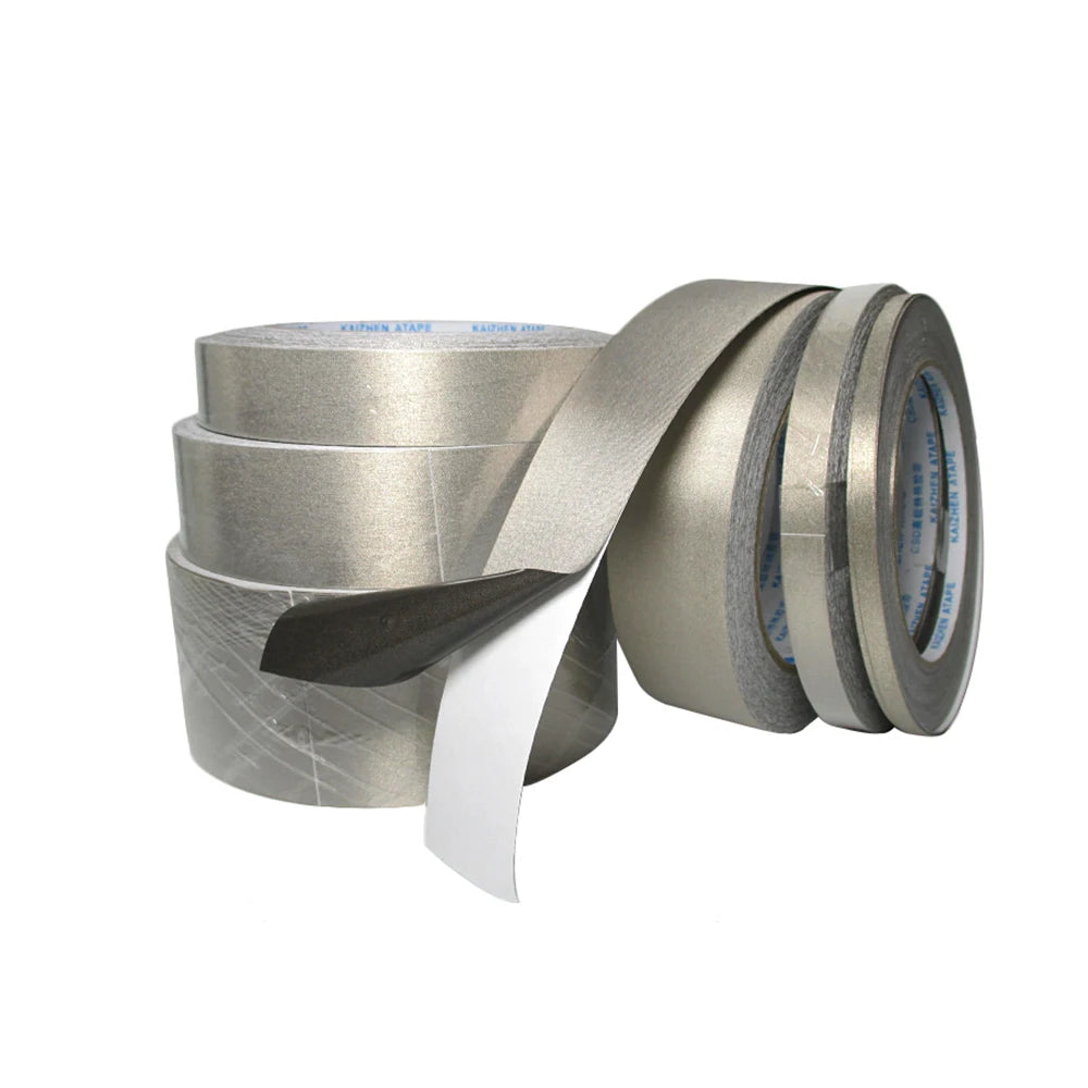 Three rolls of silver tape with one roll partially unrolled on a white background