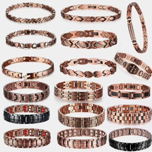 Collection of various copper and brass bracelets on a white background