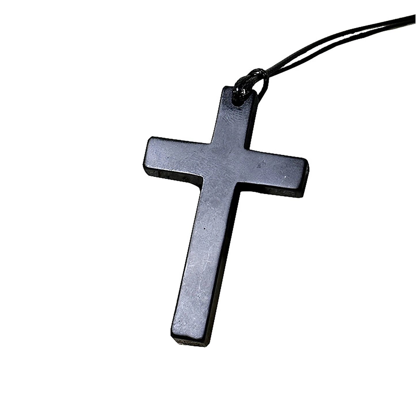 Black cross pendant on a white background