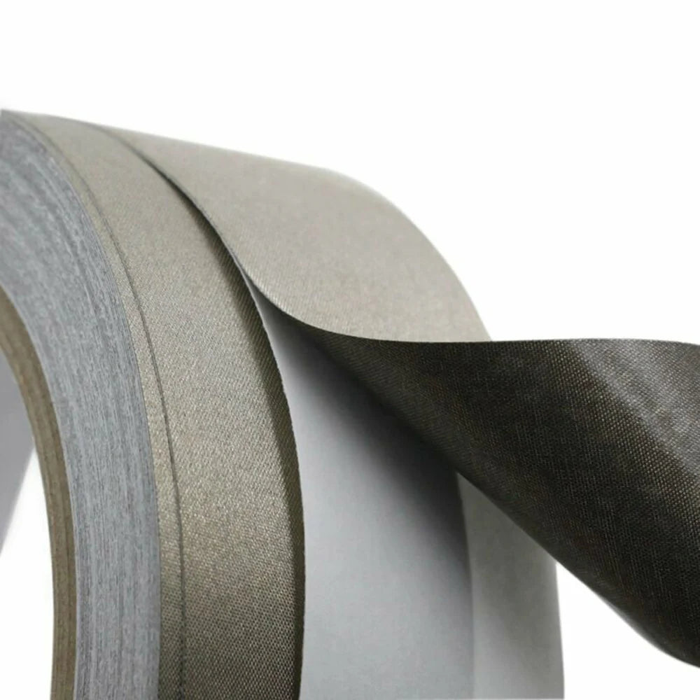 Close-up of a roll of sandpaper with different grits on a white background